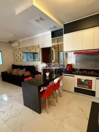 Imagem Casa à venda no Parque das Laranjeiras II em Uberaba - 3 suítes, piscina, varanda gourmet