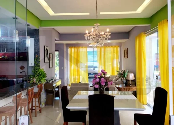 Imagem CASAL IMÓVEIS VENDE CASA TERREA MONTENEGRO BOULEVARD 3 SUÍTES