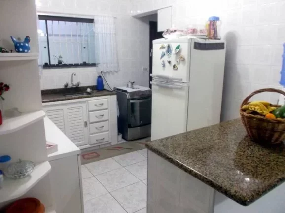 Imagem CASA COM 4 DORMITORIOS (1 SUITES)