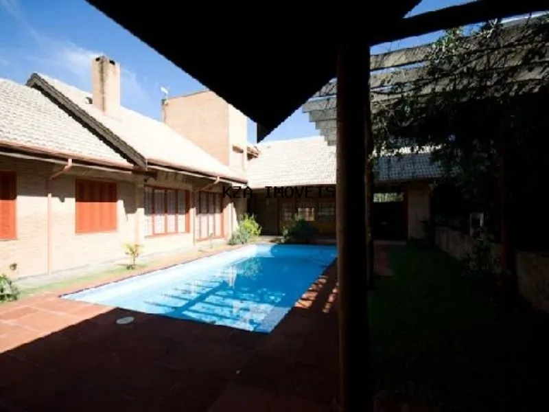 Imagem Imponente mansão de alto padrão em condomínio exclusivo de Valinhos-SP: 4 quartos, 2 suítes, 5 banheiros, 3 vagas, 450m².