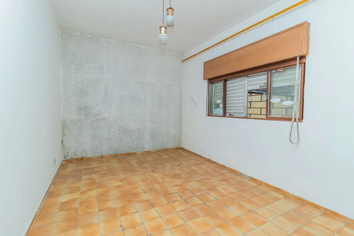 Imagem Casa de 4 dormitorios à venda Avenida Tramandaí, Ipanema - Porto Alegre