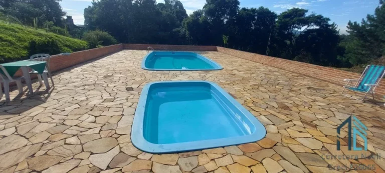 Imagem Chácara/Pousada a venda, 03 casas, 07 quartos, em ótima localização em São José dos Pinhais PR