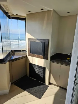Imagem Apartamento frente mar com 3 dormitórios sendo 1 suíte e 1 vaga de garagem no Centro de Itapema