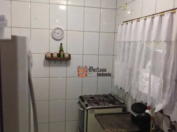 Imagem Sobrado com 2 dormitórios à venda, 180 m² por R$ 590.000,00 - Balneario Praia do Perequê - Guarujá/SP