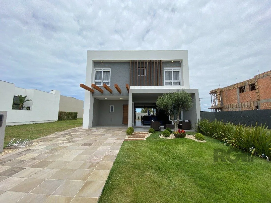 Imagem Casa de Condomínio em Atlântida Sul