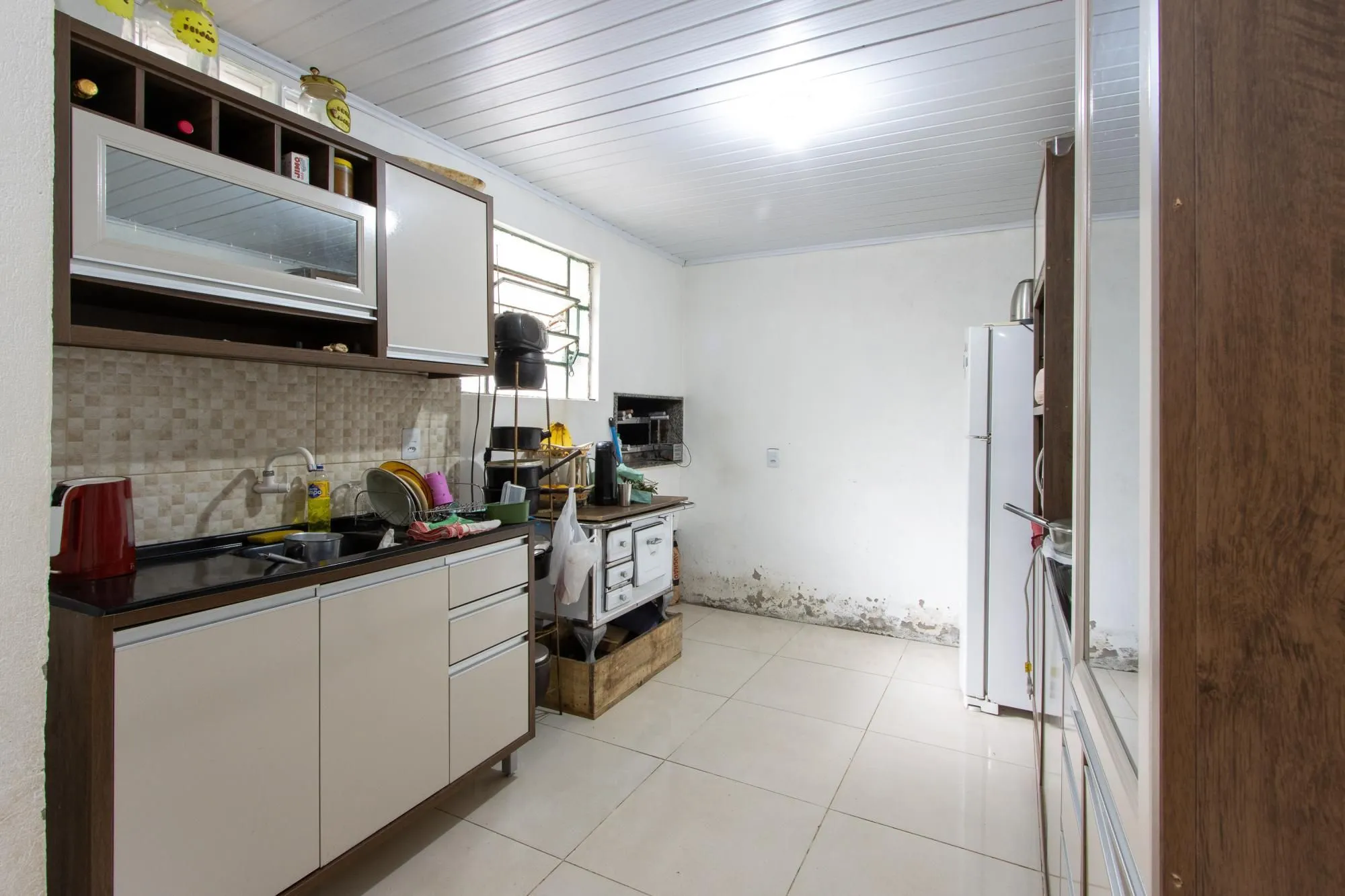 Imagem Casa ampla de 2 pavimentos com 4 dormitórios, 1 suite e 4 vagas no bairro Santa Tereza!