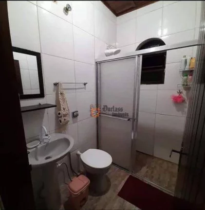 Imagem Sobrado com 4 dormitórios à venda, 230 m² por R$ 380.000 - Getuba - Caraguatatuba/SP