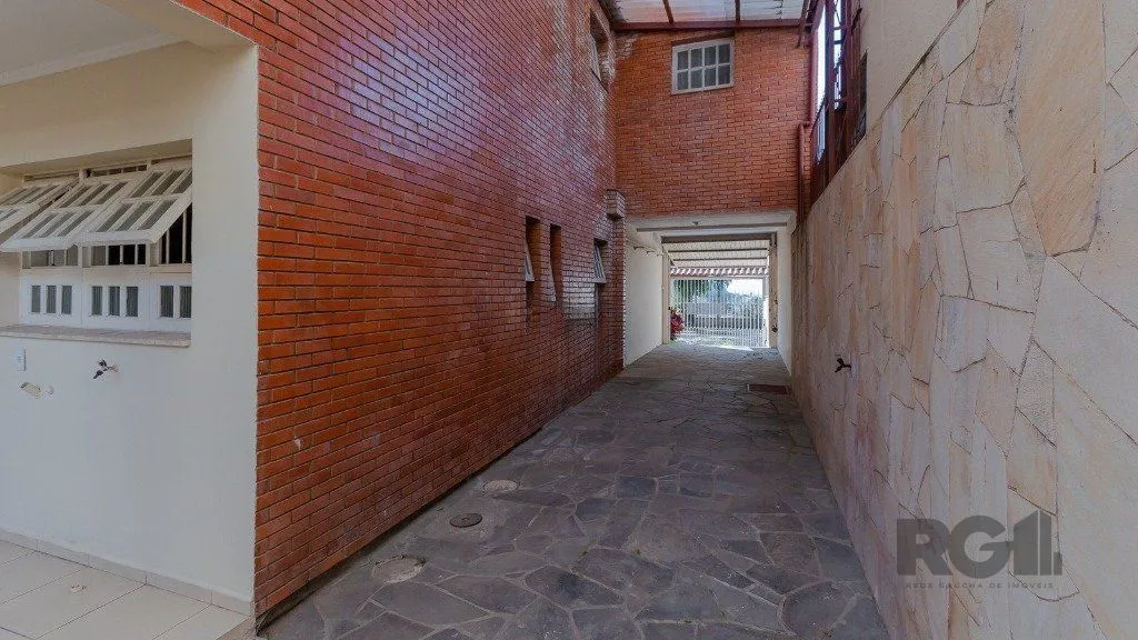 Imagem Casa com 4 dormitórios, 4 vagas no bairro Vila Jardim
