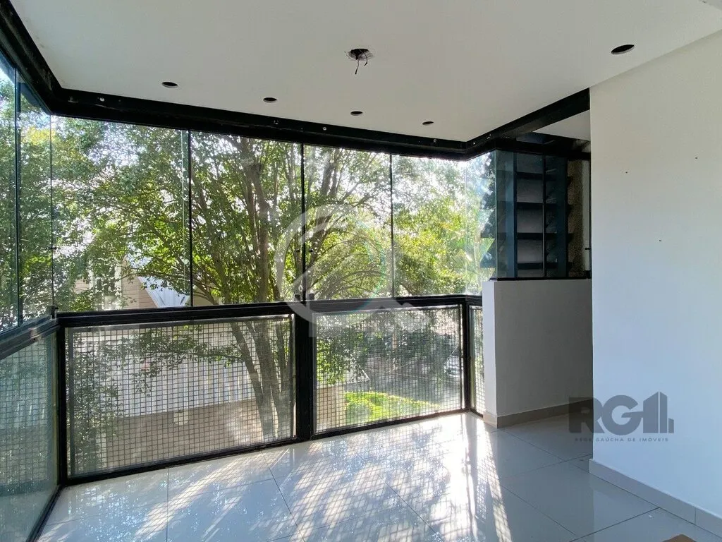Imagem Apartamento de 75m², 2 dormitórios, living amplo em L com sacada integrada, churrasqueira na sacad...