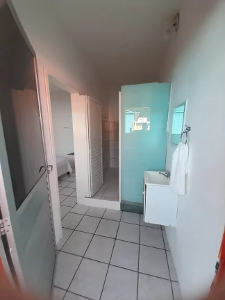 Imagem Oportunidade Única: Pousada Histórica à venda em Garopaba-SC, a 1 Quadra da Praia Central!