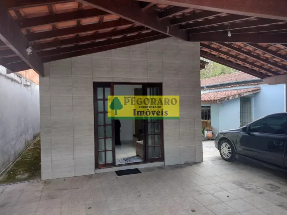 Imagem Casa à venda em Caraguatatuba-SP, bairro Rio do Ouro: 2 quartos, 2 salas, 2 banheiros, 2 vagas de garagem, 127m² - com piscina e churrasqueira!