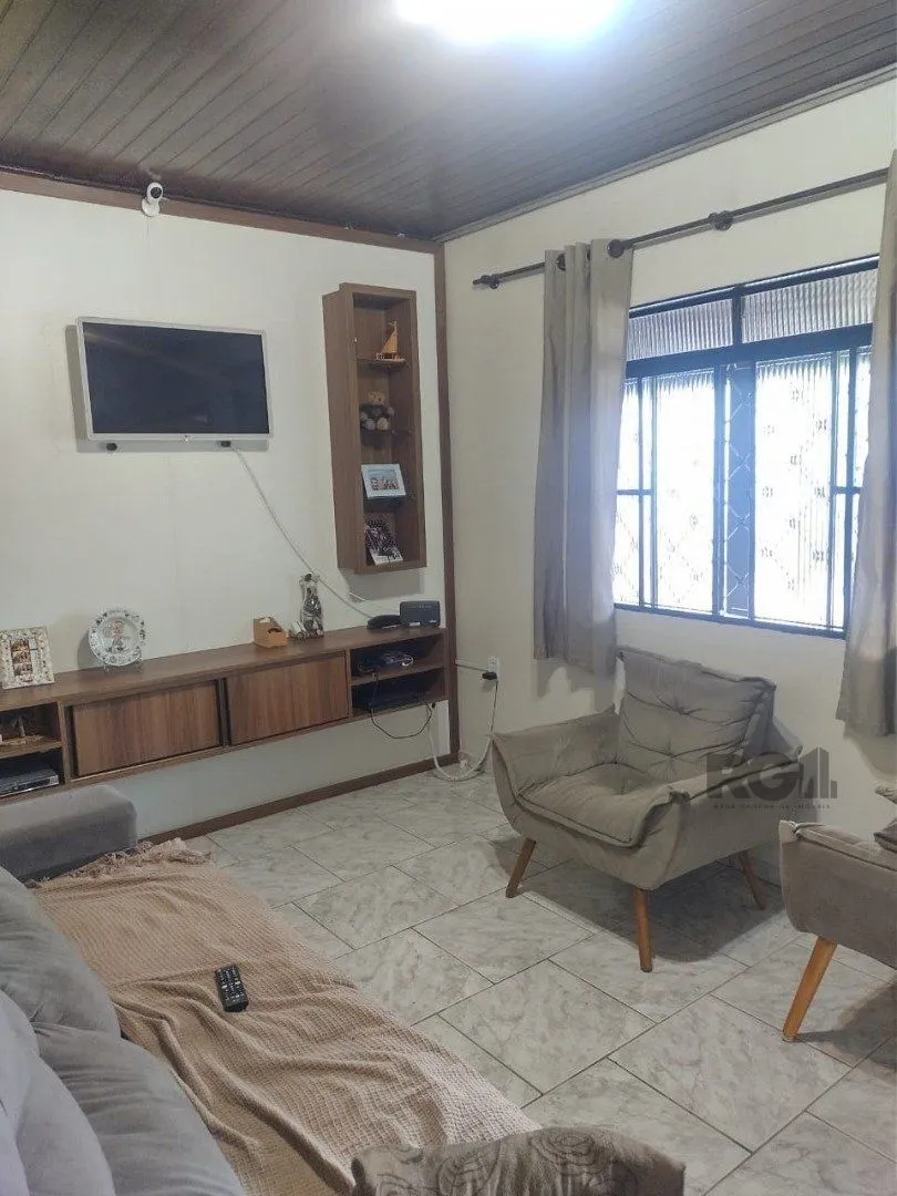 Imagem Casa de 3 dormitórios, 1 suíte e 2 vagas de garagem em Viamão.