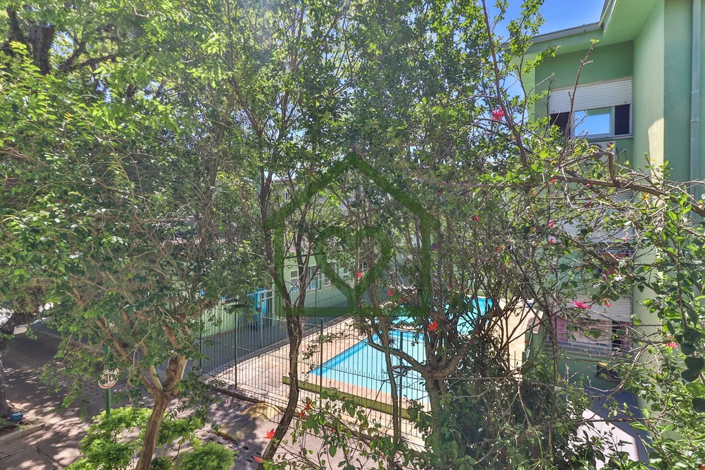 Imagem Apartamento no bairro Camaquã com 61m2 privativos, localizado a um lance de escada, composto por do...