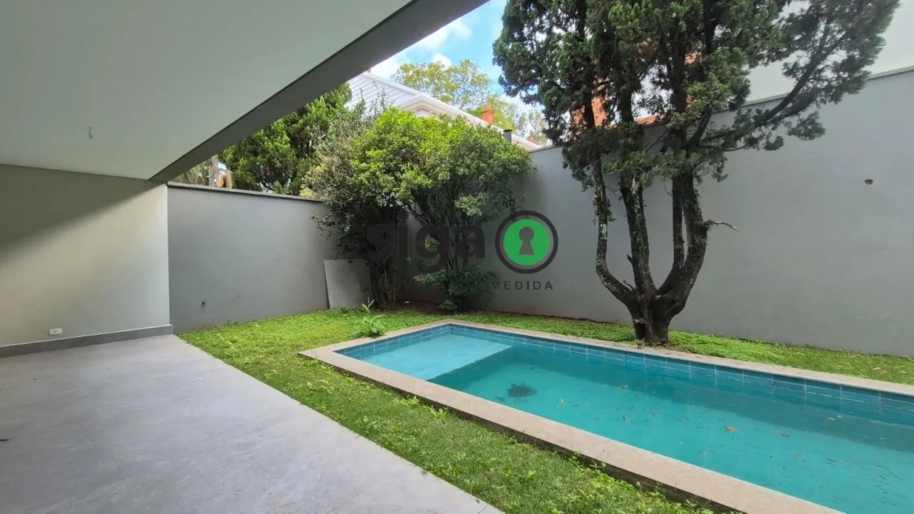 Foto do imóvel CASA EM CONDOMINIO COM 4 QUARTOS SENDO SUITES