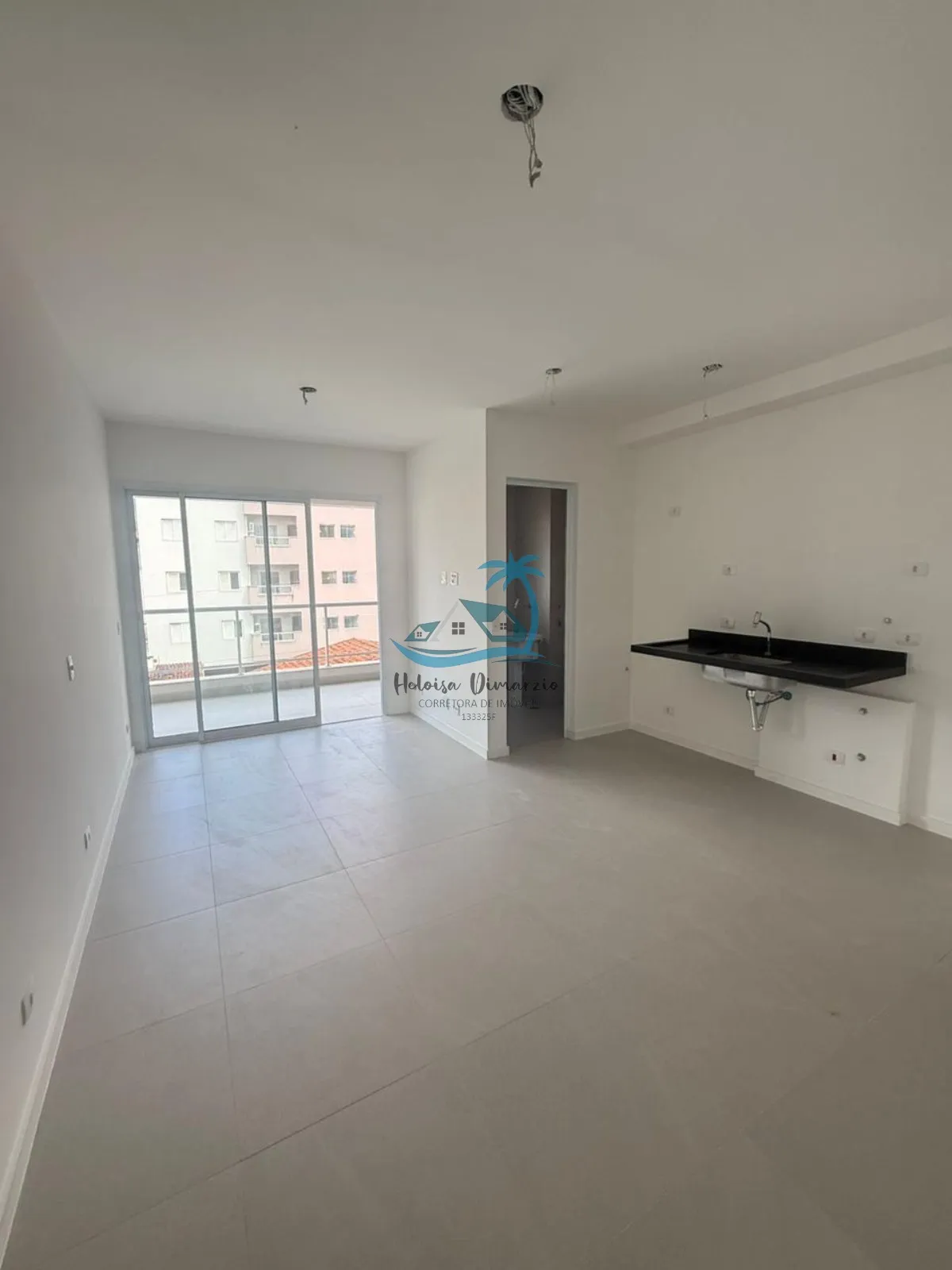 Imagem Excelente apartamento novo com 3 dormitórios a venda no bairro Itaguá - Ubatuba.