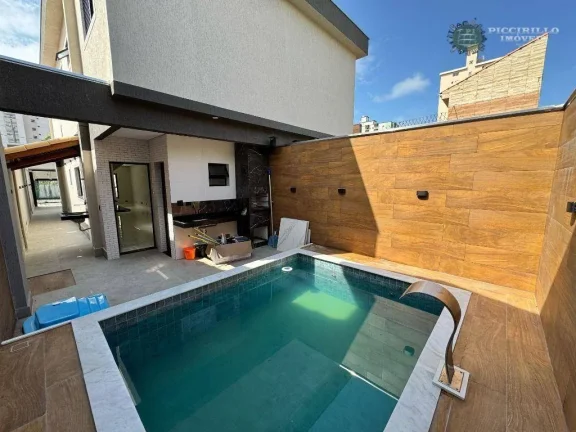 Casa com 3 dormitórios à venda, 140 m² por R$ 900.000,00 - Maracanã - Praia Grande/SP