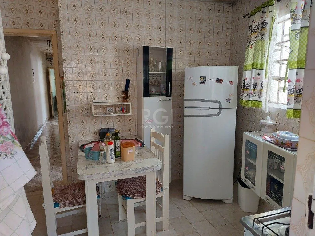 Imagem CASA COM CHURRASQUEIRA E GARAGEM PARA 2 CARROS