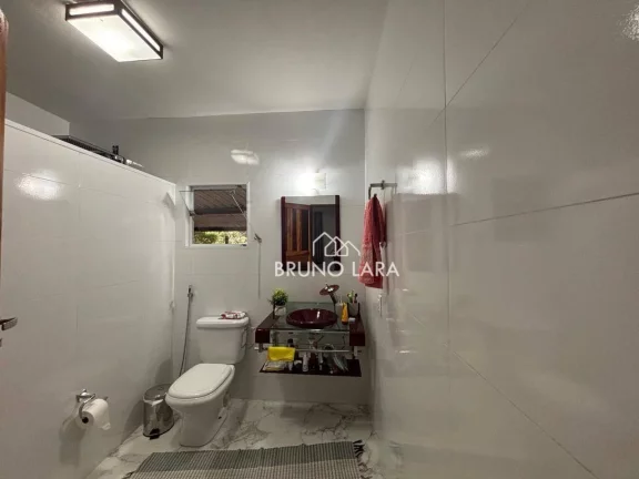 Imagem Casa com ponto comercial à venda no bairro Jardim das Roseiras - Igarapé/MG.