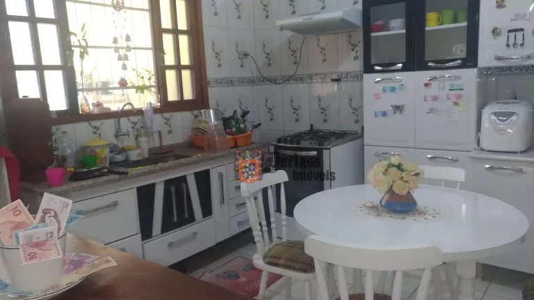 Imagem Sobrado com 3 dormitórios à venda, 180 m² por R$ 450.000 - Morro do Algodão - Caraguatatuba/SP