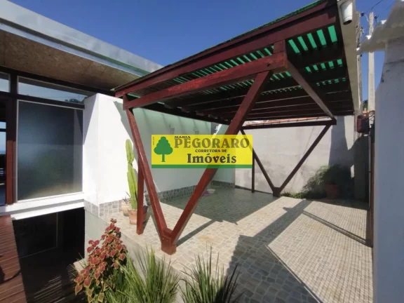 Imagem Casa à venda em Caraguatatuba-SP: 3 quartos, suíte, sala com vista para o mar e deck com hidro!