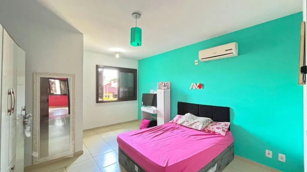 Imagem Casa de 2 dormitórios à venda Rua Heitor Kramer, Guarujá - Porto Alegre