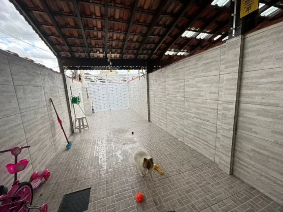 Imagem SOBRADO COM VISTA PARA O MAR à venda no Caiçara em Praia Grande-SP, com 2 dormitórios, sala, cozinha americana, banheiro social, lavabo, 2 vagas de garagem, moveis planejados, churrasqueira, 70 metros da praia. Estuda parcelamento direto.