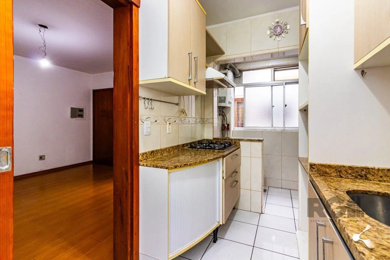 Imagem Apartamento com 2 dormitórios e 1 vaga de garagem escriturada bairro Rio Branco