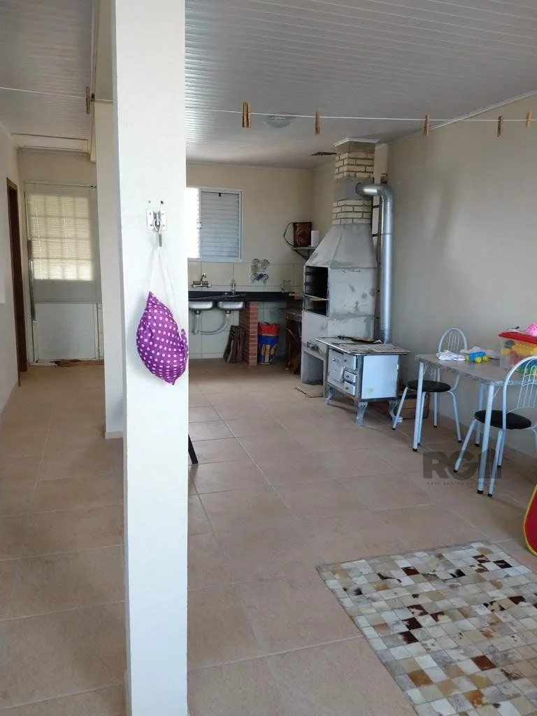 Imagem Casa 3 quartos, 4 vagas, salão de festa, sacada 198m² bairro Rubem Berta, Poa/RS