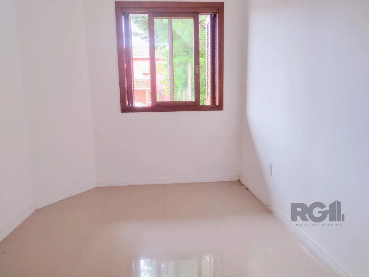 Imagem CASA TÉRREA - 2 DORMITÓRIOS, ÁREA COBERTA COM CHURRASQUEIRA , TERRAÇO - 02 VAGAS
