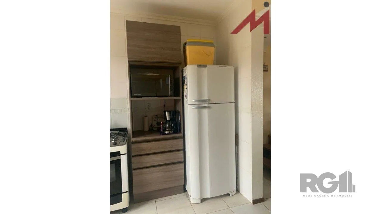 Imagem Sobrado em Trmandai com 2 suirtes, 2 banheiros, 1 vaga, churrasqueira e varanda.