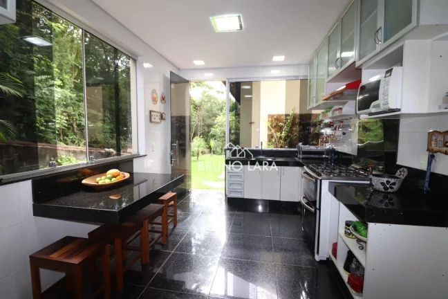 Imagem Casa à venda em Mário Campos Condomínio Serra dos Bandeirantes