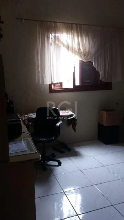 Imagem Casa com 3 dormitórios à venda, 230,11 m² por R$ 900.000,00 - Igara III - Canoas/RS