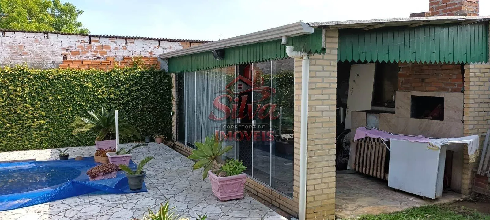 Imagem C787 | Casa de madeira com piscina à venda no Mariluz