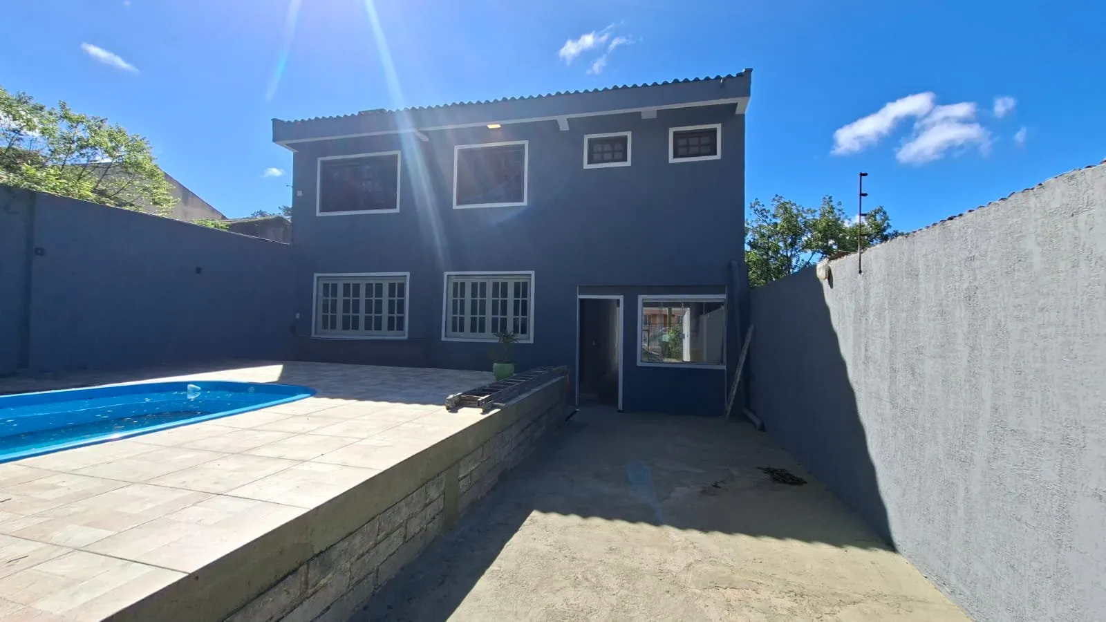 Imagem Casa impecável com suíte, piscina e espaço gourmet no Dom Feliciano - Centro de Viamão!