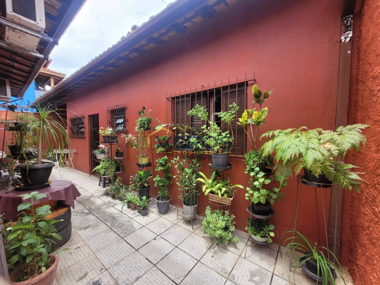 Imagem Casa térrea a venda com 4 quartos no Bairro Indaiá Caraguatatuba