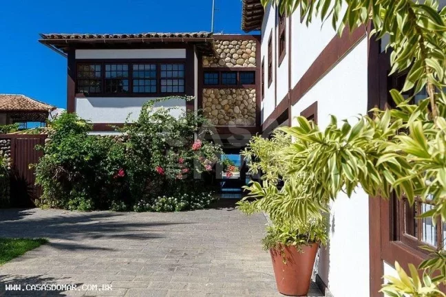 Imagem Imóvel de luxo em condomínio à beira-mar em Búzios-RJ: 5 quartos, 5 suítes, 8 banheiros, 3 vagas, 650m² de área. Venha conferir!