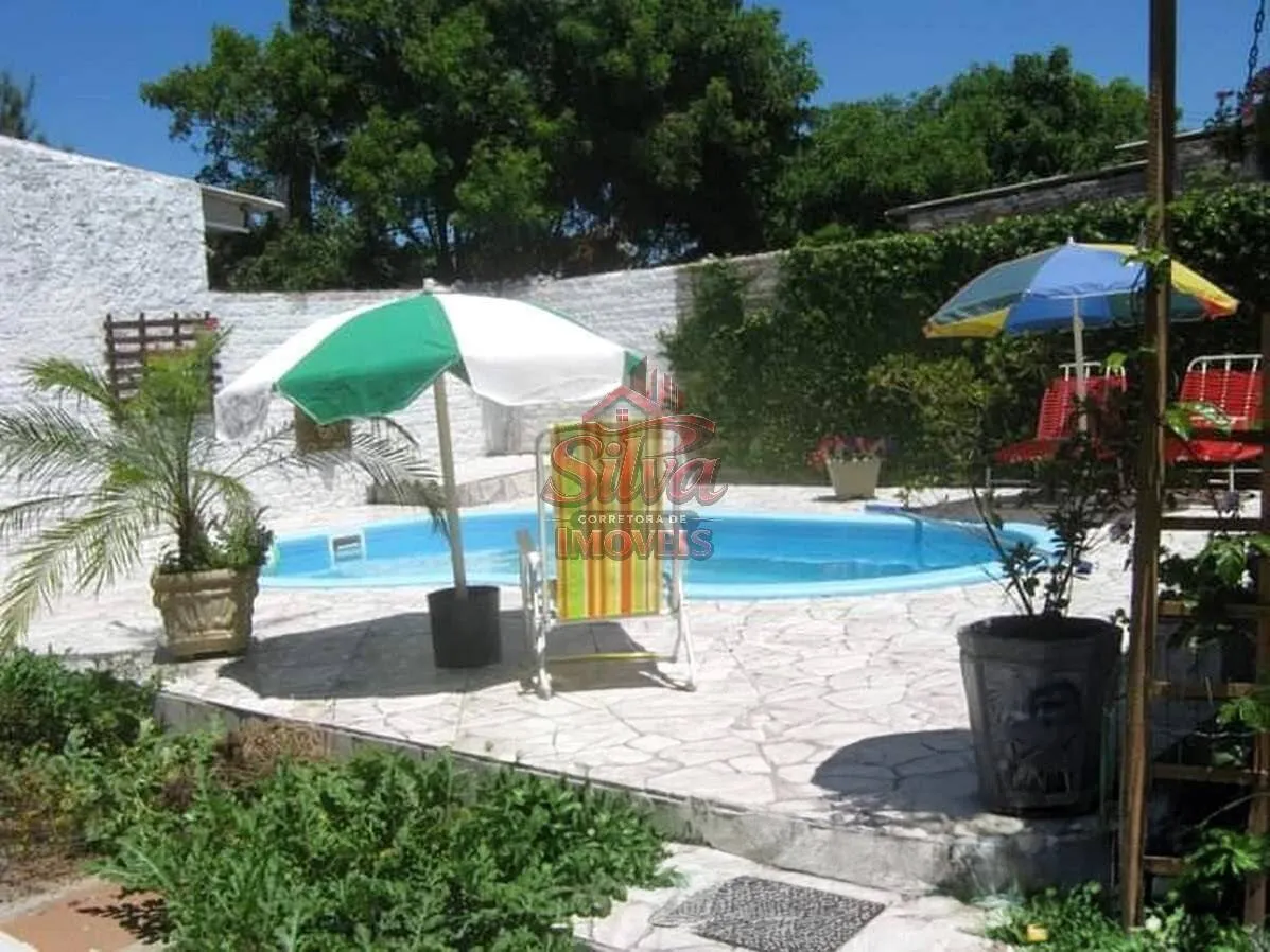 Imagem C787 | Casa de madeira com piscina à venda no Mariluz