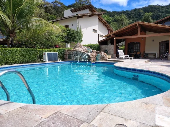 Imagem Casa no condomínio Granville 4 suítes, 2 salas, 806,4 m2 de área, 6 vagas de garagem no Guarujá-SP