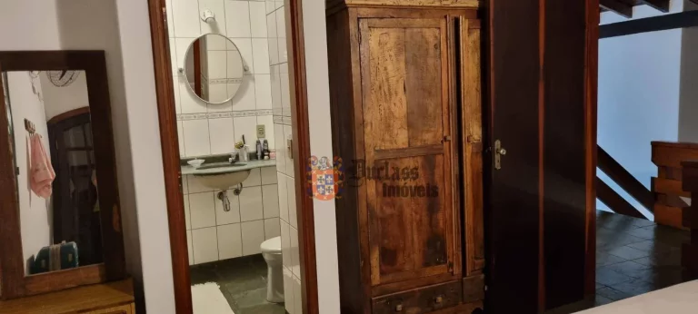 Imagem Sobrado com 4 suítes à venda, 215 m² por R$ 950.000 - Massaguaçu - Caraguatatuba/SP