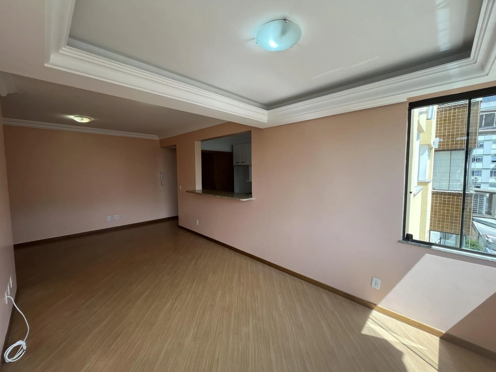 Imagem Apartamento de dois quartos, suíte e uma vaga de garagem no bairro Menino Deus