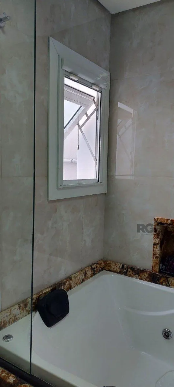 Imagem Casa com 2 dormitórios, sendo 1 suíte no bairro Florida em Guaíba