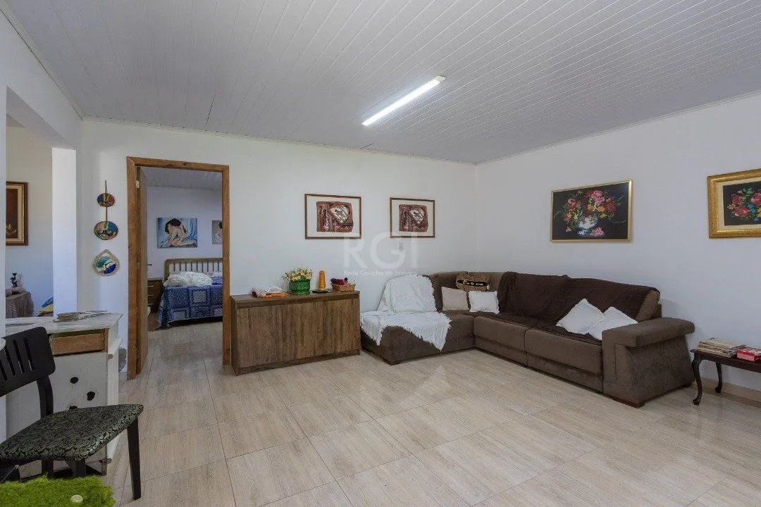 Imagem Casa para Venda - 370m², 4 dormitórios, sendo 1 suites, 6 vagas - Lomba do Pinheiro