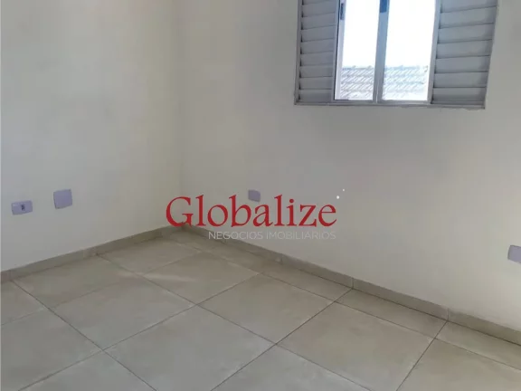 Imagem Casa sobreposta alta à venda com 72m², 2 quartos, 1 suíte, churrasqueira por R$315.000,00 em Santos