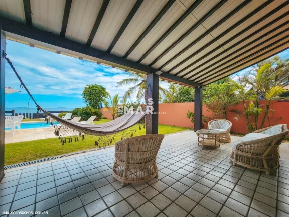 Imagem Magnífica casa de frente para o mar em condomínio de luxo em Geribá, Búzios-RJ: 6 quartos, 6 suítes, 6 salas, 7 banheiros, 4 vagas e 800m² de puro requinte!