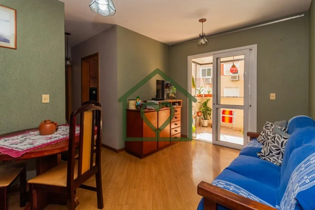 Excelente Apartamento com 2 dormitórios um deles com suíte, amplo living com dois ambientes com sa...