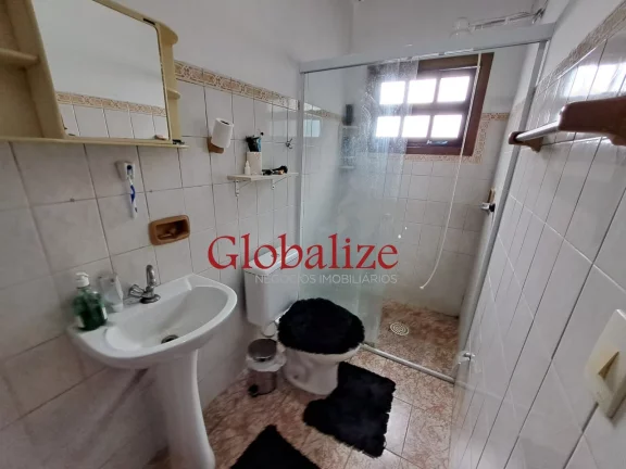 Imagem Sobrado à venda com 118m², 3 quartos, 2 suítes, 2 vagas, churrasqueira por R$1015.000,00 no Boqueirão em Santos