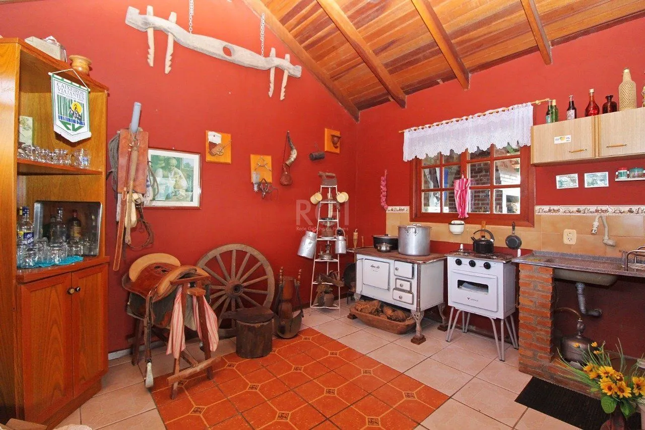 Imagem Casa para Venda - 339m², 3 dormitórios, 2 vagas - Vila Nova, Porto Alegre