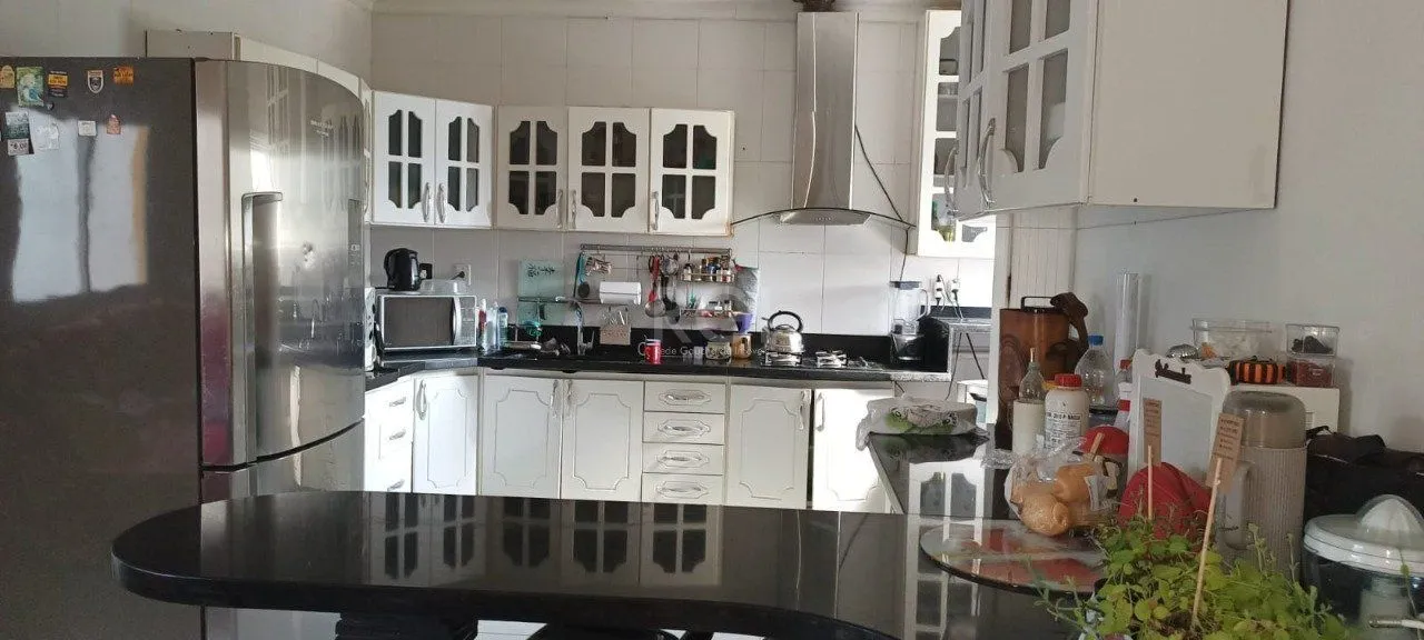 Imagem Casa para Venda - 250m², 3 dormitórios, sendo 1 suites, 2 vagas - Vila Nova, Porto Alegre