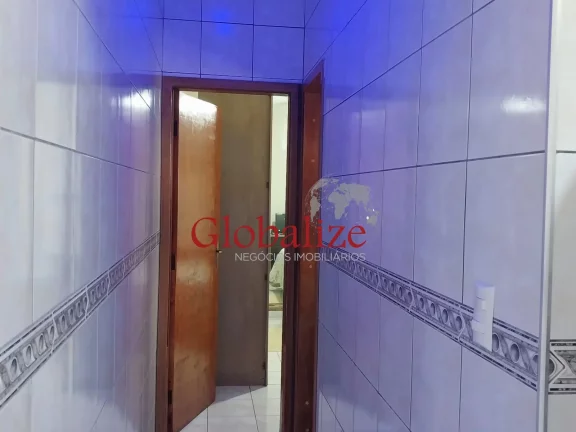 Imagem Casa térrea à venda com 125m², 2 quartos, churrasqueira, área coberta, vaga de garagem coberta por R$390.000,00 em Santos