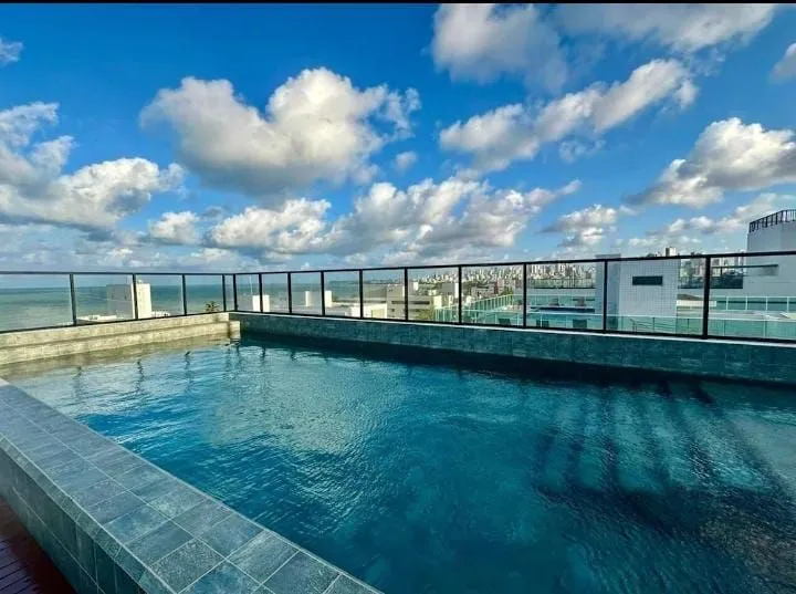 Imagem Loft moderno no Bessa, a 50m do mar, com suíte climatizada, coworking, piscina e segurança 24h.